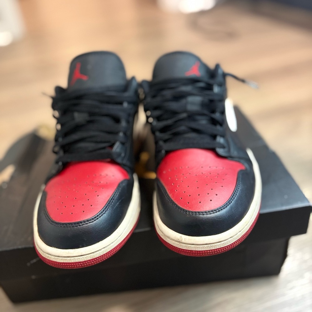 Nike Air Jordan 1 Low Alternate Bred Toe sneaker.